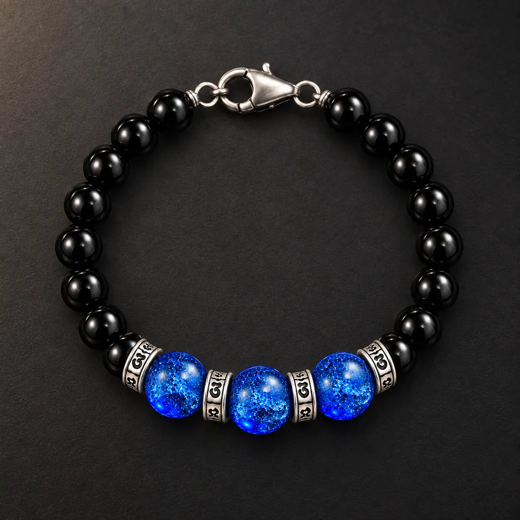 Top view of natural black obsidian and blue Liuli bracelet