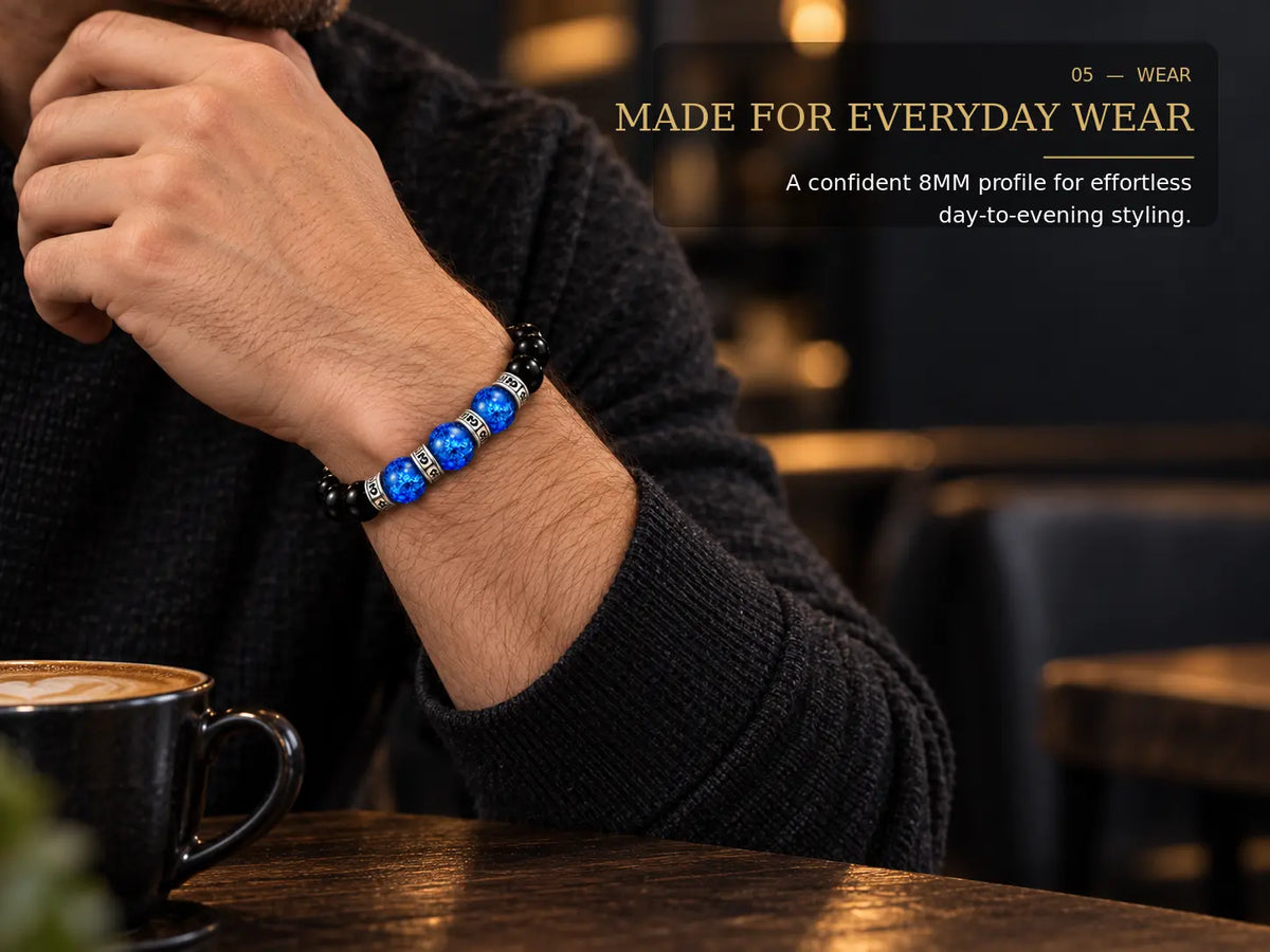 Black obsidian and blue Liuli bracelet worn by male model