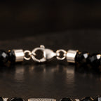 Alloy lobster clasp and connector structure on black obsidian bracelet