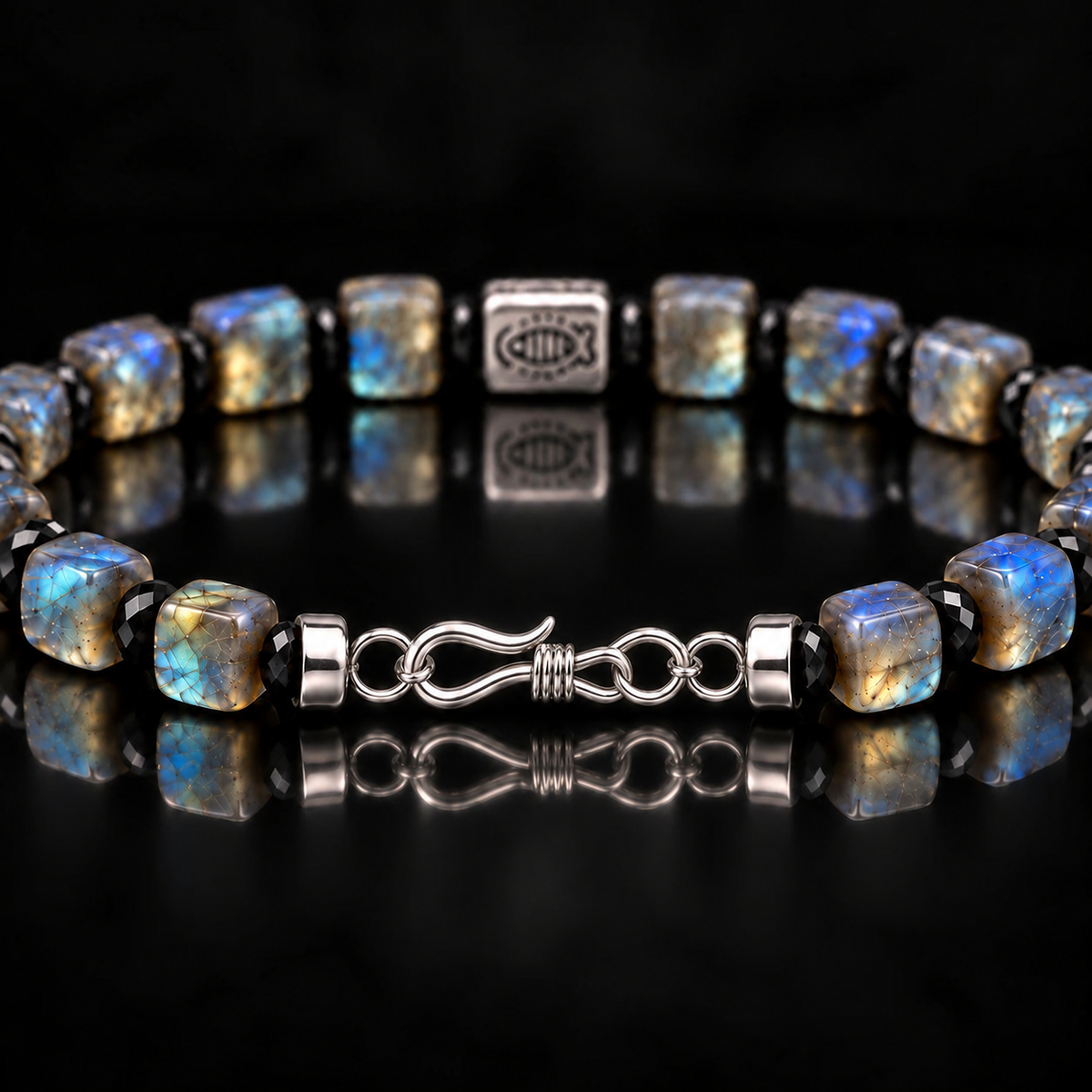 Labradorite and obsidian bracelet worn on wrist