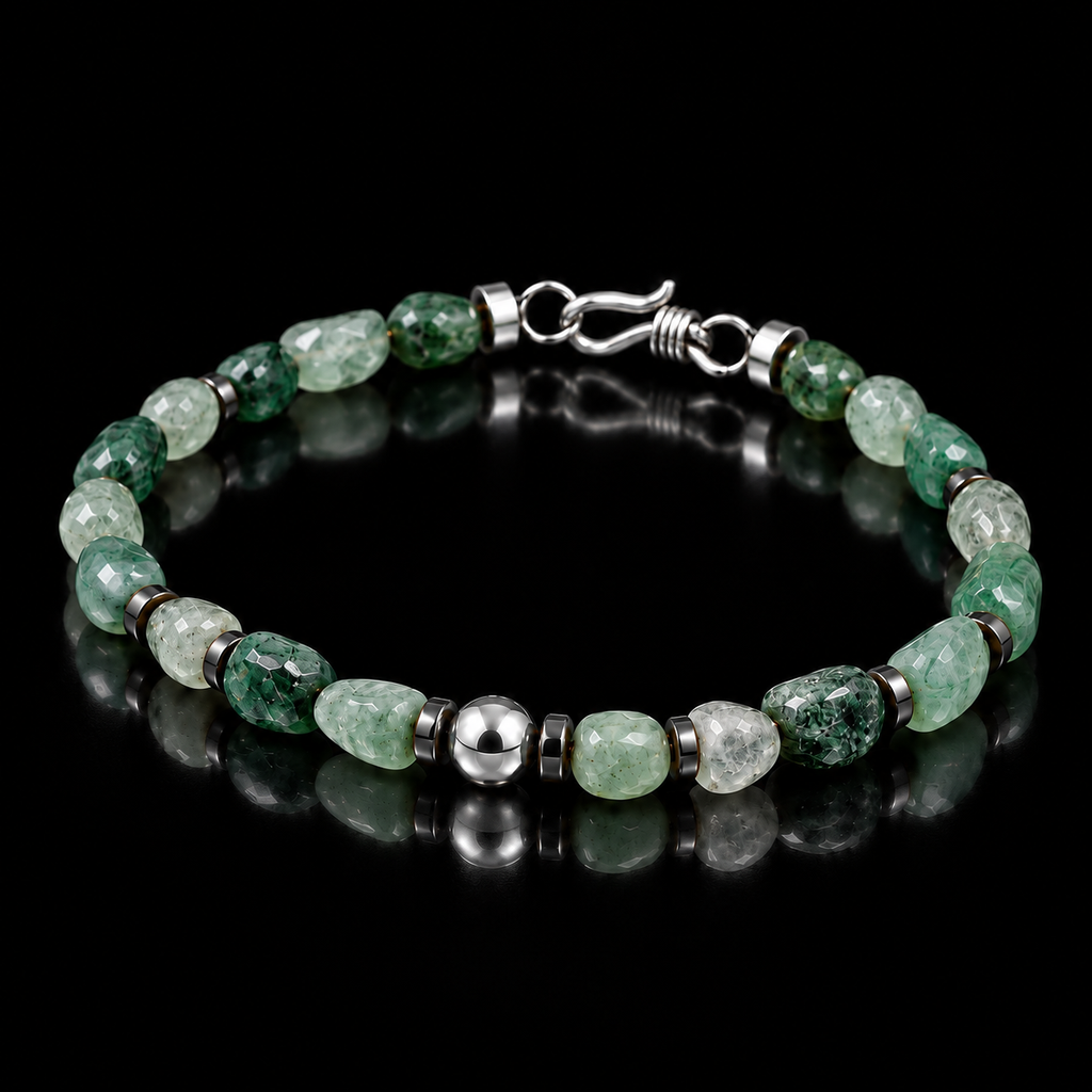 Angled view of natural freeform green agate bracelet with hematite spacers