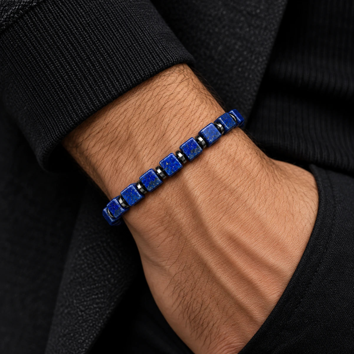 Natural lapis lazuli cube bracelet worn on wrist
