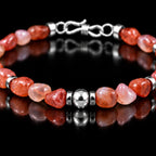 Close-up of freeform Nanhong agate beads and polished S925 silver details