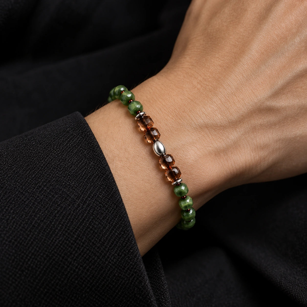 Nephrite jade and smoky quartz bracelet worn on wrist