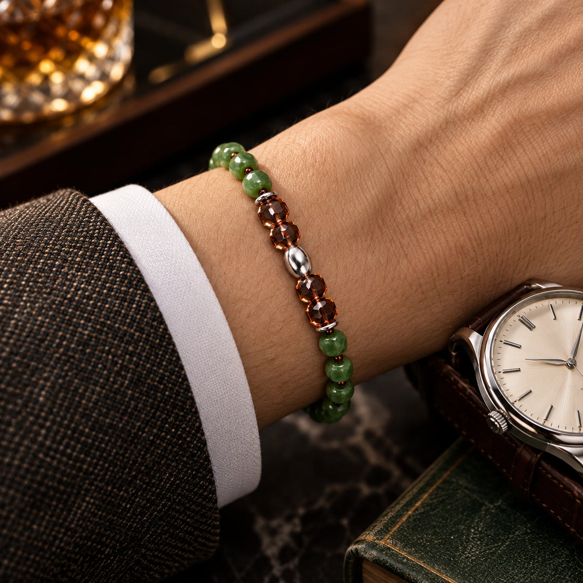 Nephrite jade and smoky quartz bracelet styled beside a watch