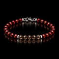 Complete red tiger eye and smoky quartz bracelet on black background