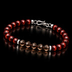Angled view of red tiger eye bracelet with S925 silver hook clasp