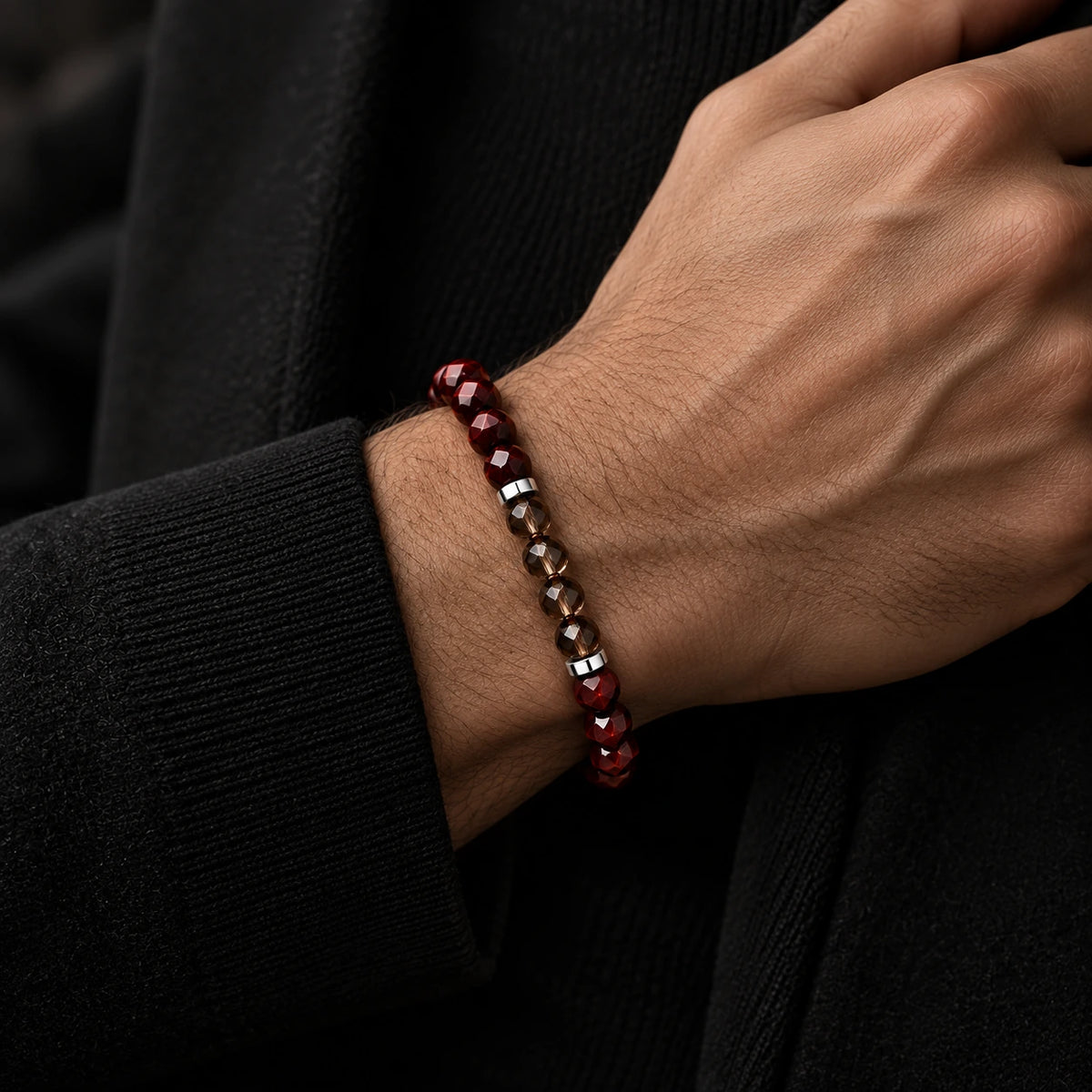Red tiger eye and smoky quartz bracelet worn on wrist