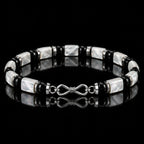 S925 infinity clasp detail on L&X mother-of-pearl obsidian bracelet