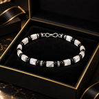 L&X mother-of-pearl obsidian bracelet in black and gold gift box