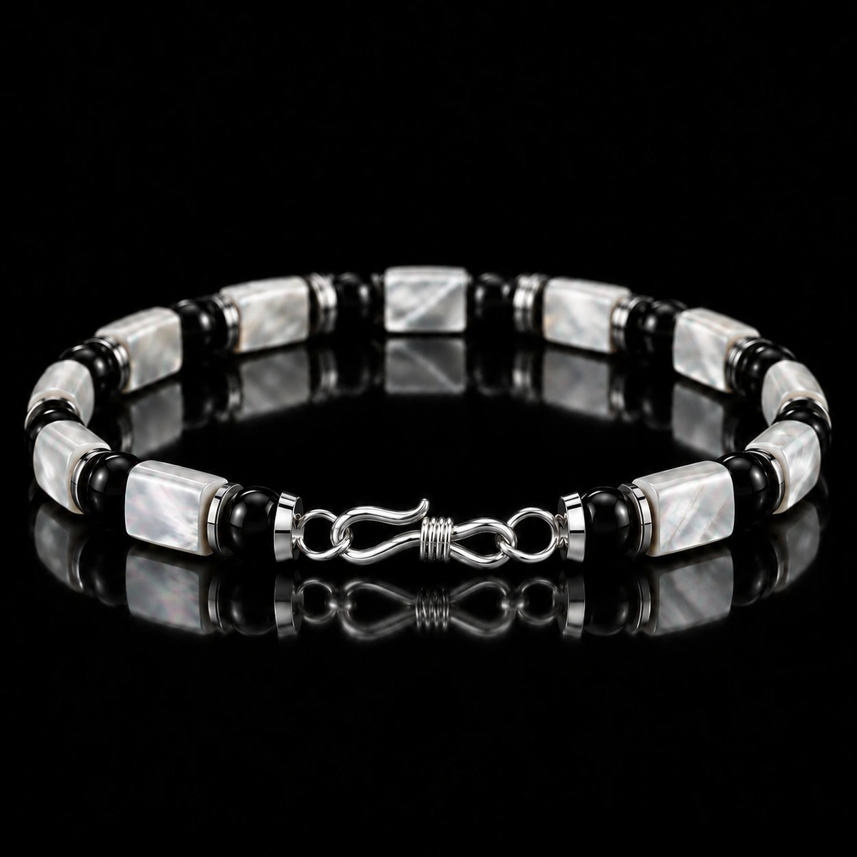 S925 infinity clasp detail on L&X mother-of-pearl obsidian bracelet