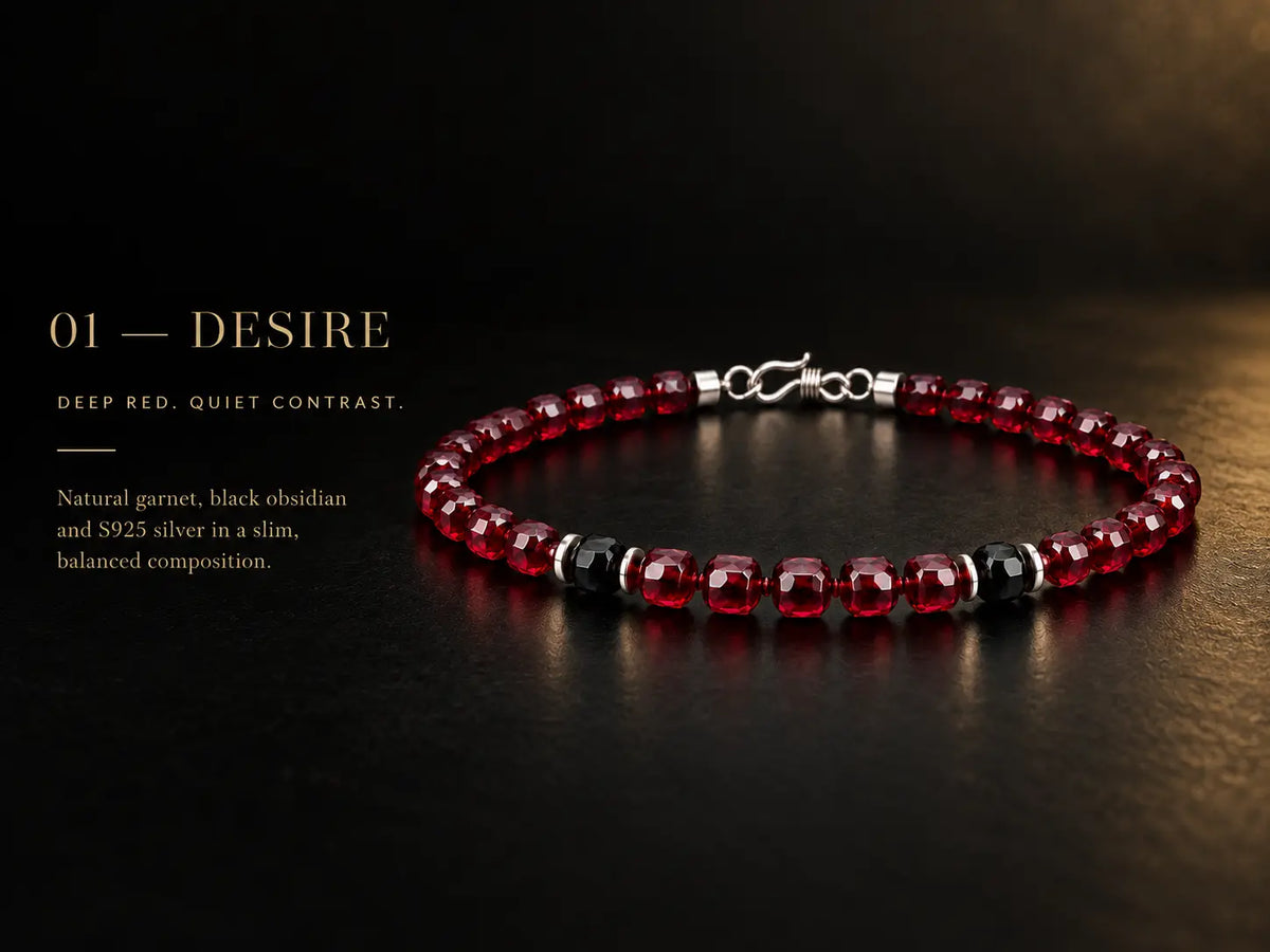 Deep red garnet bracelet with black obsidian and S925 silver in a restrained black-and-gold setting.