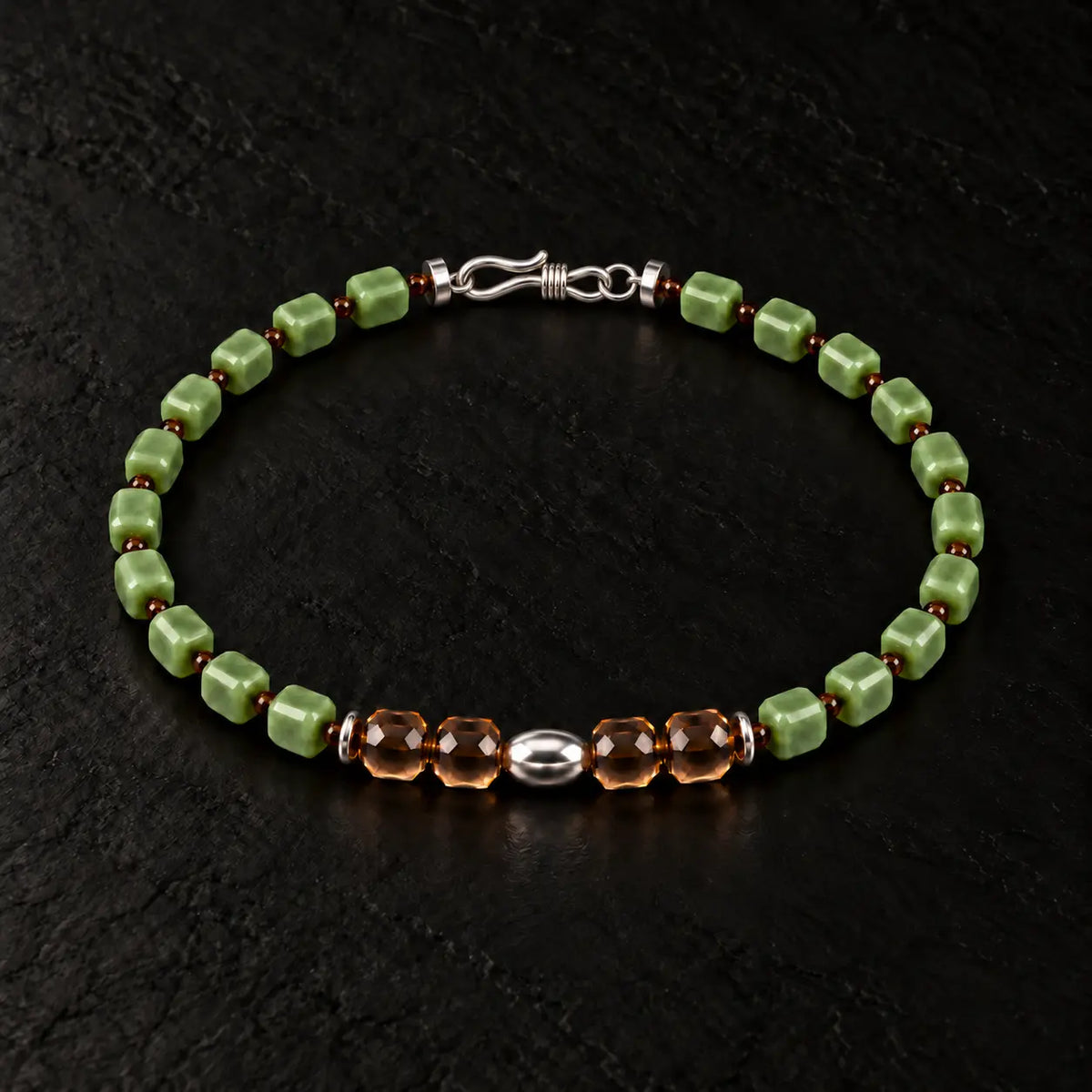 Complete natural nephrite bracelet showing the S925 hook clasp and bead construction.
