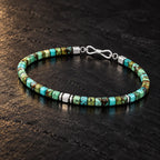 Natural turquoise faceted cube bracelet shown at a 45-degree angle to reveal color and surface variation.