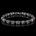 Black rutilated quartz 4 to 4.5mm bracelet worn on wrist